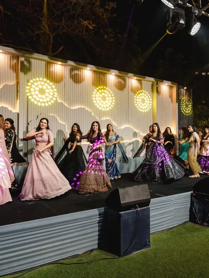 A full view of the bride squad on stage. We use formations and stage spacing to make sure the group looks cohesive and professional.