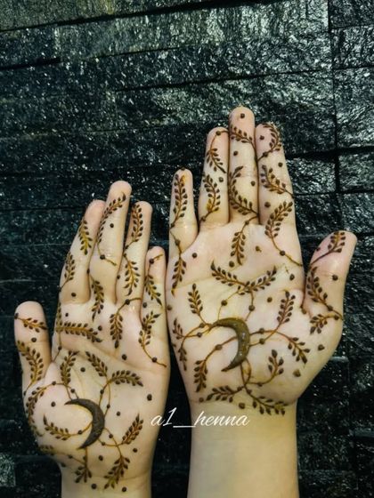 The same moon and vine design against a dark background, making the pattern stand out.