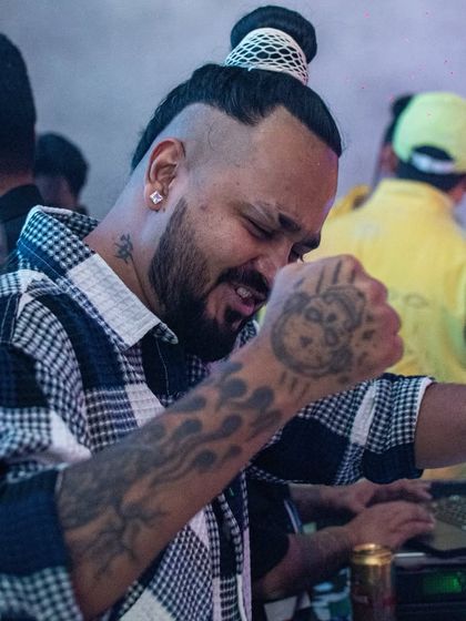 A candid shot of me feeling the music at the launch of Gillys Super Bar.