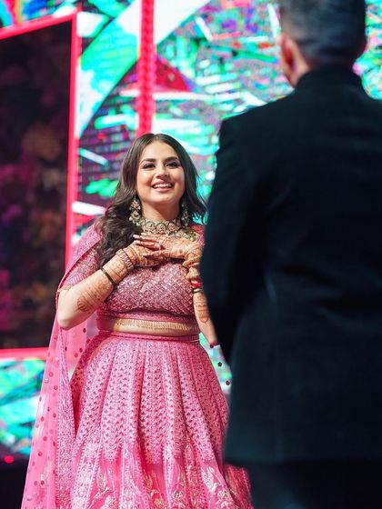 The look of love. My choreography is designed to create moments like this, where the groom is captivated by his bride's performance.