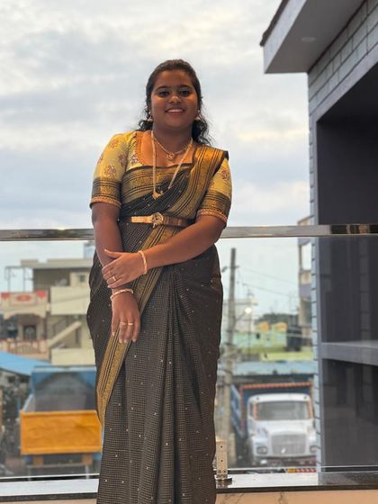 Varsha looking beautiful and confident in her saree and custom blouse. It's a joy to see my creations styled so perfectly.