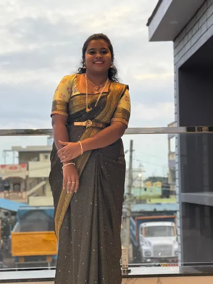 Varsha looking beautiful and confident in her saree and custom blouse. It's a joy to see my creations styled so perfectly.