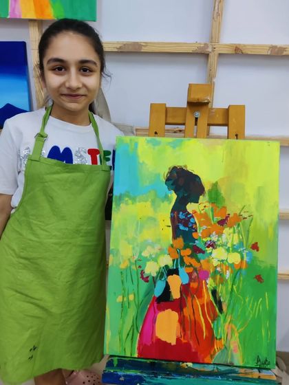 The creation of a colorful, abstract silhouette painting, showing the process of layering bright acrylics to create a stunning final piece.