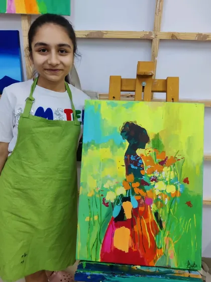 The creation of a colorful, abstract silhouette painting, showing the process of layering bright acrylics to create a stunning final piece.