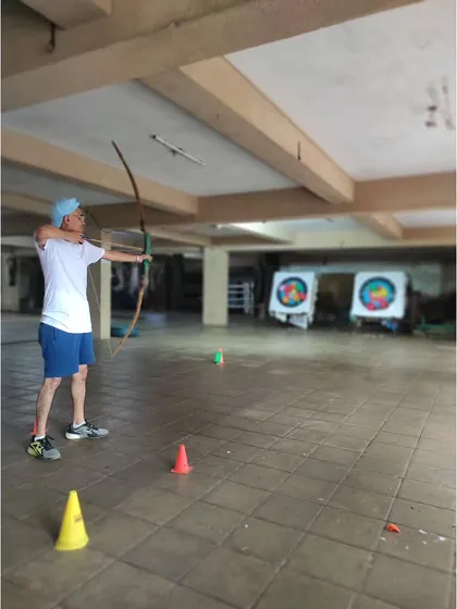 An adult student practices his shot. My camp is a great place for adults to pick up a new hobby and challenge themselves.