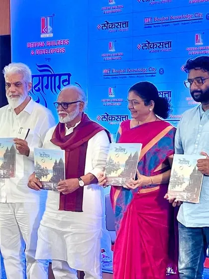 A photo from the launch event of the "Godagaurav" coffee table book, where my paintings were featured on the cover. Here, dignitaries are holding the book.