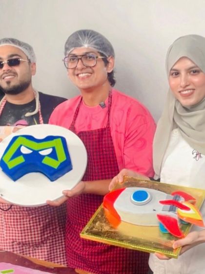 Proudly displaying the two custom cakes created during the live stream: the S8UL logo cake and a fun rocket ship cake. This shows our ability to engage in fun, interactive brand collaborations.