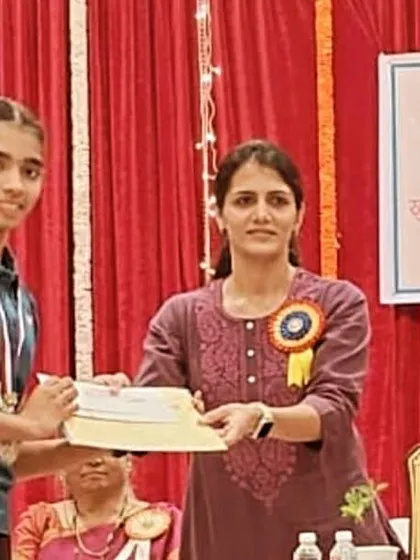 Netra Jhalani receiving her silver medal for the under-17 Girls singles event at the Vanita Samaja Open Maharashtra state tournament.