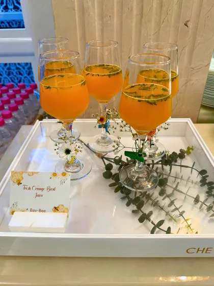 A tray of our 'Jerk Orange Beet Juice', a unique and healthy beverage option. We love to create innovative flavour combinations for our clients.