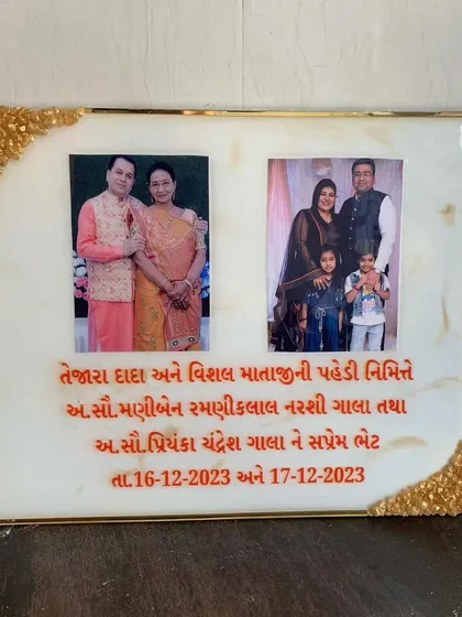 A rectangular photo frame with two pictures and a personalized message, accented with a gold geode design on the corners.