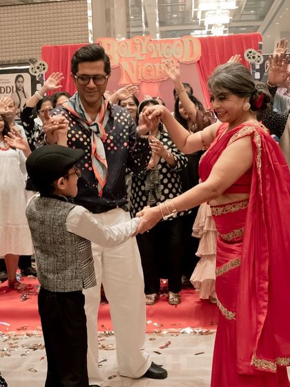 The goal of any celebration is to create moments of shared joy. Seeing guests of all ages come together on the dance floor at this retro-themed party was a highlight. I help curate the music and atmosphere to get everyone moving.