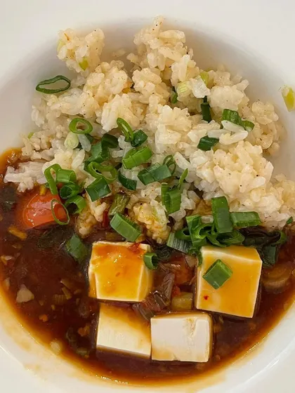 A comforting bowl of Mapo Tofu with sticky rice, served as part of our first sit-down lunch event. It's a simple dish that's packed with flavour.