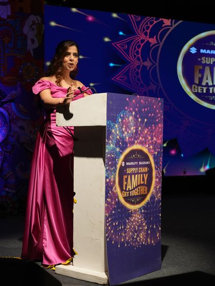 Commanding the stage at the Maruti Suzuki event. Even in a large hall, it's important to project confidence and connect with people in the back rows.