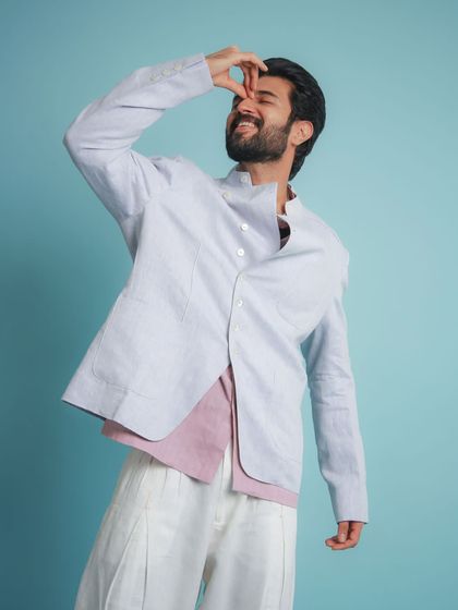 A playful, candid moment from the shoot. This look is all about feeling comfortable and confident.