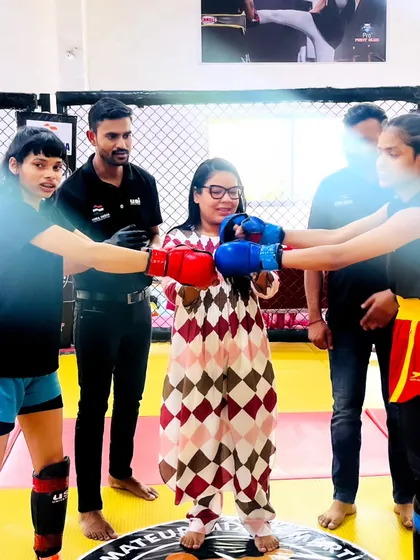 Two of our female fighters facing off before their bout at the Delhi State MMA Championship. We are proud to have a strong team of women warriors.