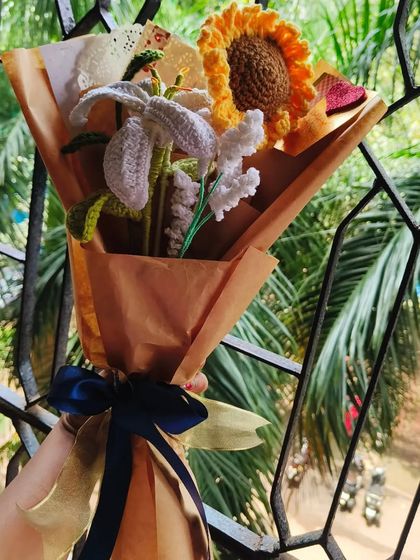 Another angle of the sunflower and lily bouquet. I love how the rustic brown paper makes the colors of the flowers stand out.
