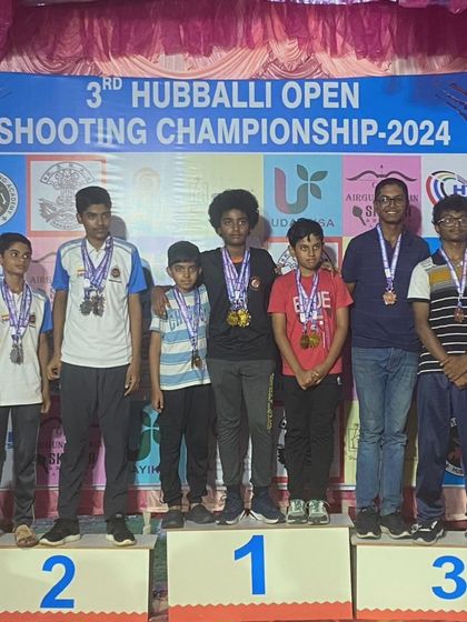 A wider view of the winners' podium at the Hubballi Open, with our shooters taking the top spots.