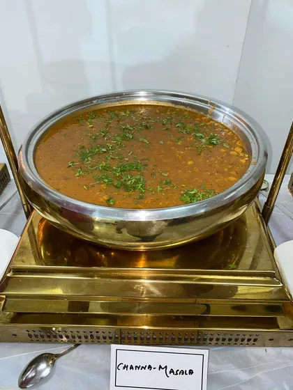 A staple at any North Indian gathering, our Channa Masala is cooked with a blend of traditional spices for an authentic taste. It is a versatile dish that is always a crowd-pleaser.