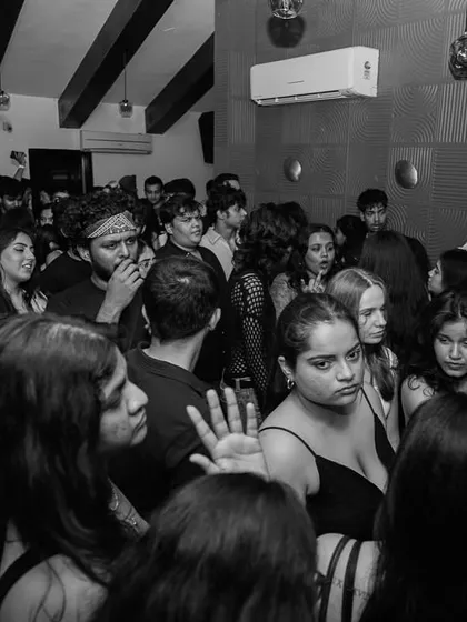 A black and white photo of the packed dance floor. The energy was incredible.