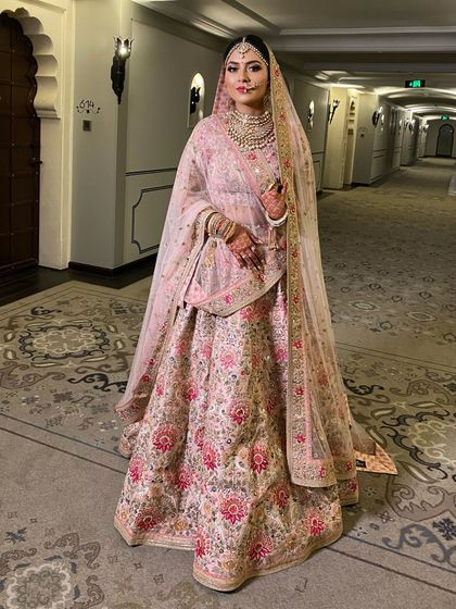 A Sabyasachi bride deserves nothing less than perfection. I created a look with deep, dramatic kohl eyes and a perfect pink lip, just as she requested.