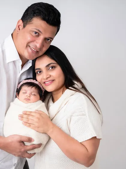 This beautiful 40-day-old baby girl had the most gorgeous hair. Even if you miss the first few weeks, we can still capture beautiful, sleepy newborn-style photos.