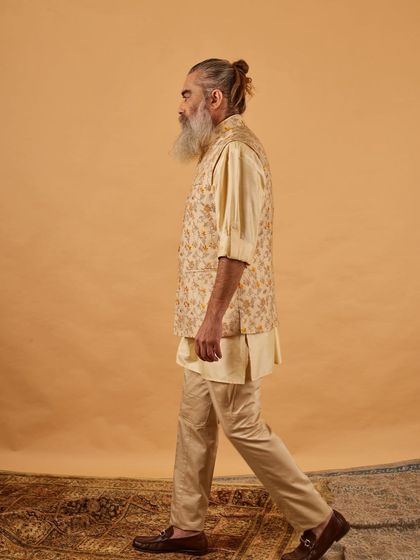 A side profile of the floral vest and kurta, showing the clean lines and comfortable drape of the outfit. It’s a perfect blend of classic and contemporary.