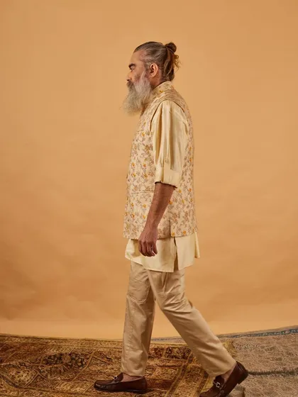 A side profile of the floral vest and kurta, showing the clean lines and comfortable drape of the outfit. It’s a perfect blend of classic and contemporary.