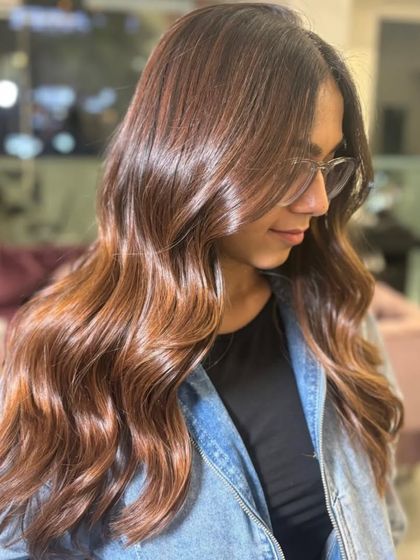 A side view of this effortless balayage, showing the soft waves and beautiful shine.