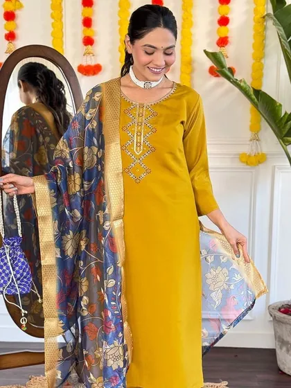 I love the combination of mustard and blue in this viscose chanderi kurta set. The printed dupatta is the star of this outfit.