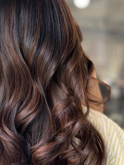 A close-up of the dreamy balayage blend, highlighting the soft texture and flawless color transition.