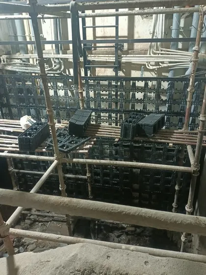 Here you can see the initial setup in a challenging space, with scaffolding and panels ready for installation. I can build a vertical garden almost anywhere.