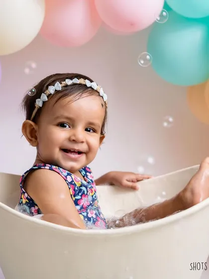 The splash session after the cake smash is always a hit. Bubbles and warm water make for very happy babies and even happier photos.
