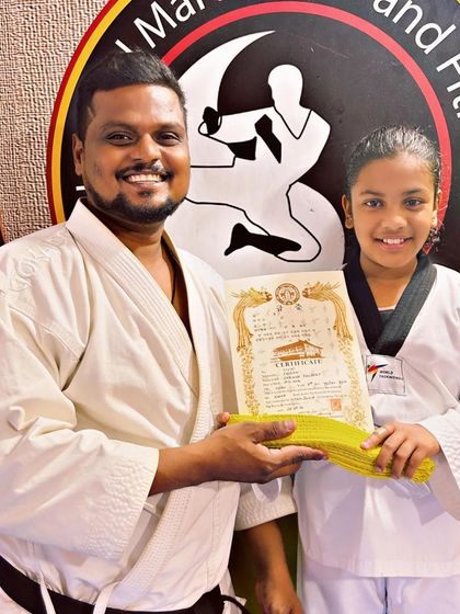 National Martial Arts and Fitness Academy - Kids Martial Arts & Fitness The Journey of Discipline: Belt Graduations photo 9