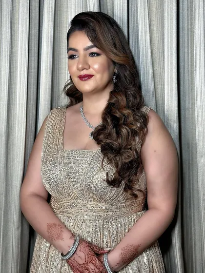 Seret looking confident and beautiful. The makeup is designed to last through a night of celebrating.