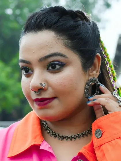 A close-up of my makeup and accessories for the Aditya Gadhvi concert. The look is modern with a touch of traditional, reflecting the fusion music of the event.