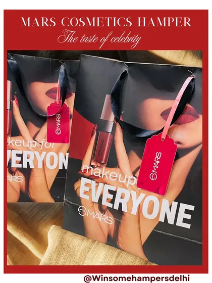 The branded "Makeup for Everyone" bags I used for the Mars Cosmetics campaign. The bold red design and custom tags create a strong brand statement, which is key for successful PR and influencer seeding.