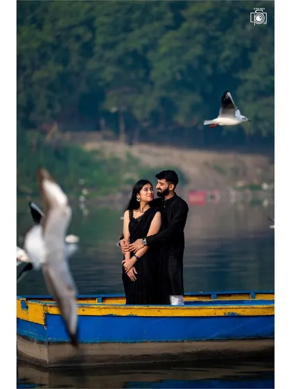 Your love story deserves a beautiful setting. For this pre-wedding shoot at Yamuna Ghat, we created a serene and timeless portrait, capturing the couple's connection amidst the calm waters and flying birds.
