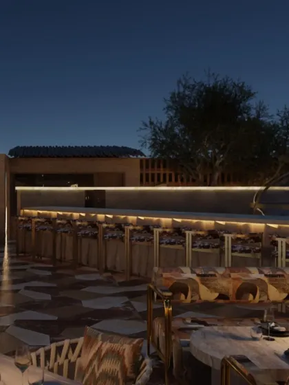 The rooftop bar at Zuvaah, set against the night sky. The design for the terrace was an airy Mediterranean escape, contrasting with the cavernous interior below.