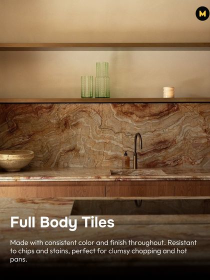 Full-body vitrified tiles are an excellent choice for countertops. The color and finish are consistent throughout the tile, making them highly resistant to chips and stains from clumsy chopping or hot pans.