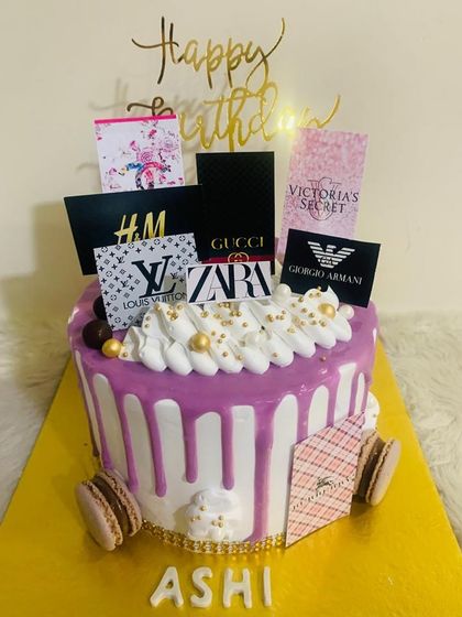 For the shopaholic in your life! This fun drip cake is decorated with edible logos of top fashion brands like Gucci, Zara, and Louis Vuitton.