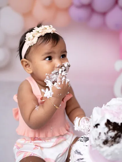 A close-up shot capturing the delicious mess. These photos are all about celebrating the fun and freedom of being one.