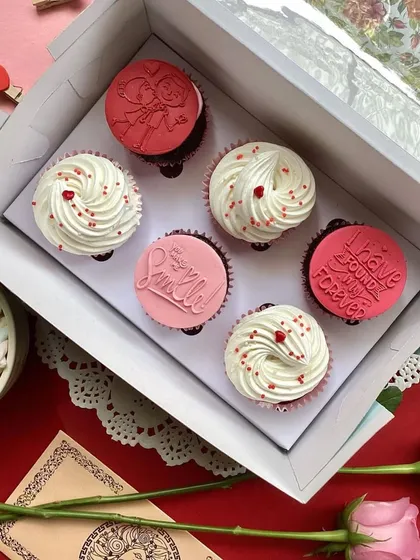 Say it with cupcakes this Valentine's Day. This box features a mix of beautifully frosted cupcakes and others with sweet, romantic messages.