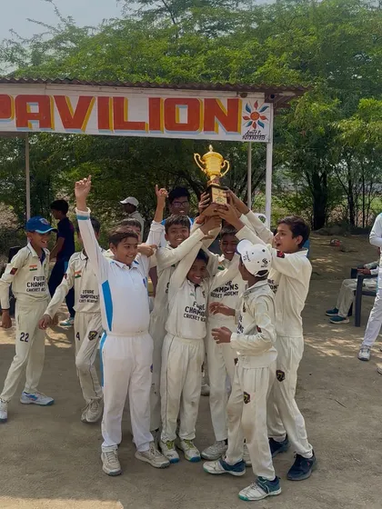 The champions celebrate. A great team effort to win the tournament.