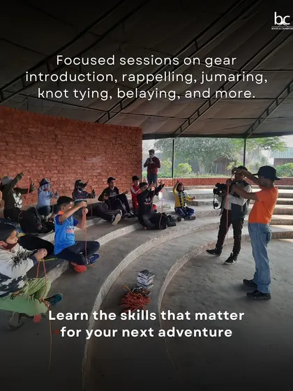 An instructor demonstrates knot tying during a workshop. Mastering these fundamental skills is crucial for safety and efficiency on the mountain.