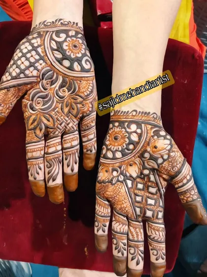 I used bold strokes and shading in this design to create depth. The mix of floral circles, leaf patterns, and checkered fills gives the hands a very full and festive appearance.