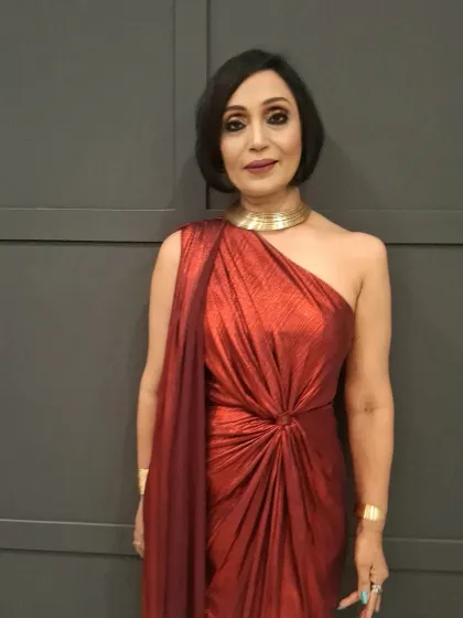 An elegant look for Dr. Jas, a trailblazer in the field of education. The makeup is sophisticated and poised, just like her.