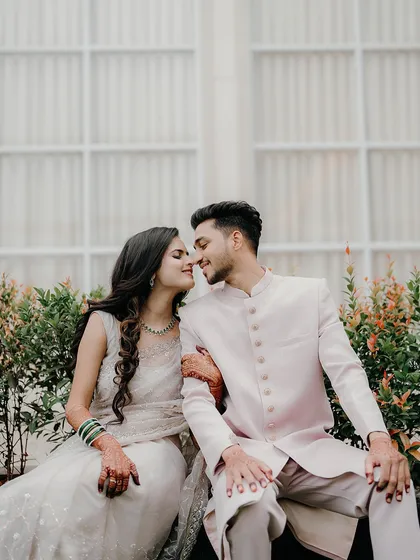 An elegant portrait that speaks without words. This close-up captures the gentle connection and quiet understanding between a couple, perfect for celebrating a new beginning.