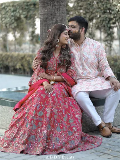 A sweet and romantic portrait of the couple, sharing a quiet moment together amidst the wedding festivities.