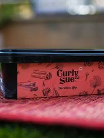 My branded packaging for Curly Sue Pork. I often announce pop ups and night markets where you can find a full range of my pork dishes, from Pandicurry to pulled pork burgers, alongside my veggie options.