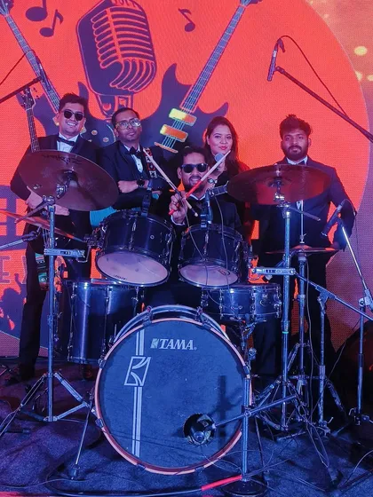 A fun picture behind the drum kit after a performance for the State Bank of India.